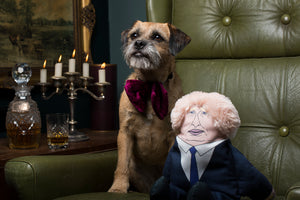 Boris Johnson dog toy sat in gentleman's club with dog
