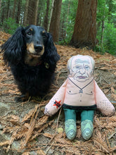 Load image into Gallery viewer, Vladimir Putin dog toy in forest with dog
